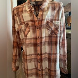 Brand new, soft ladies flannel. Beautiful colors.